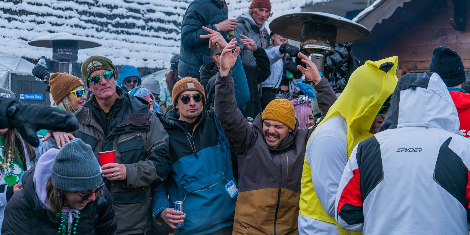 Guys partying in the Back Forty on Carnival Weekend