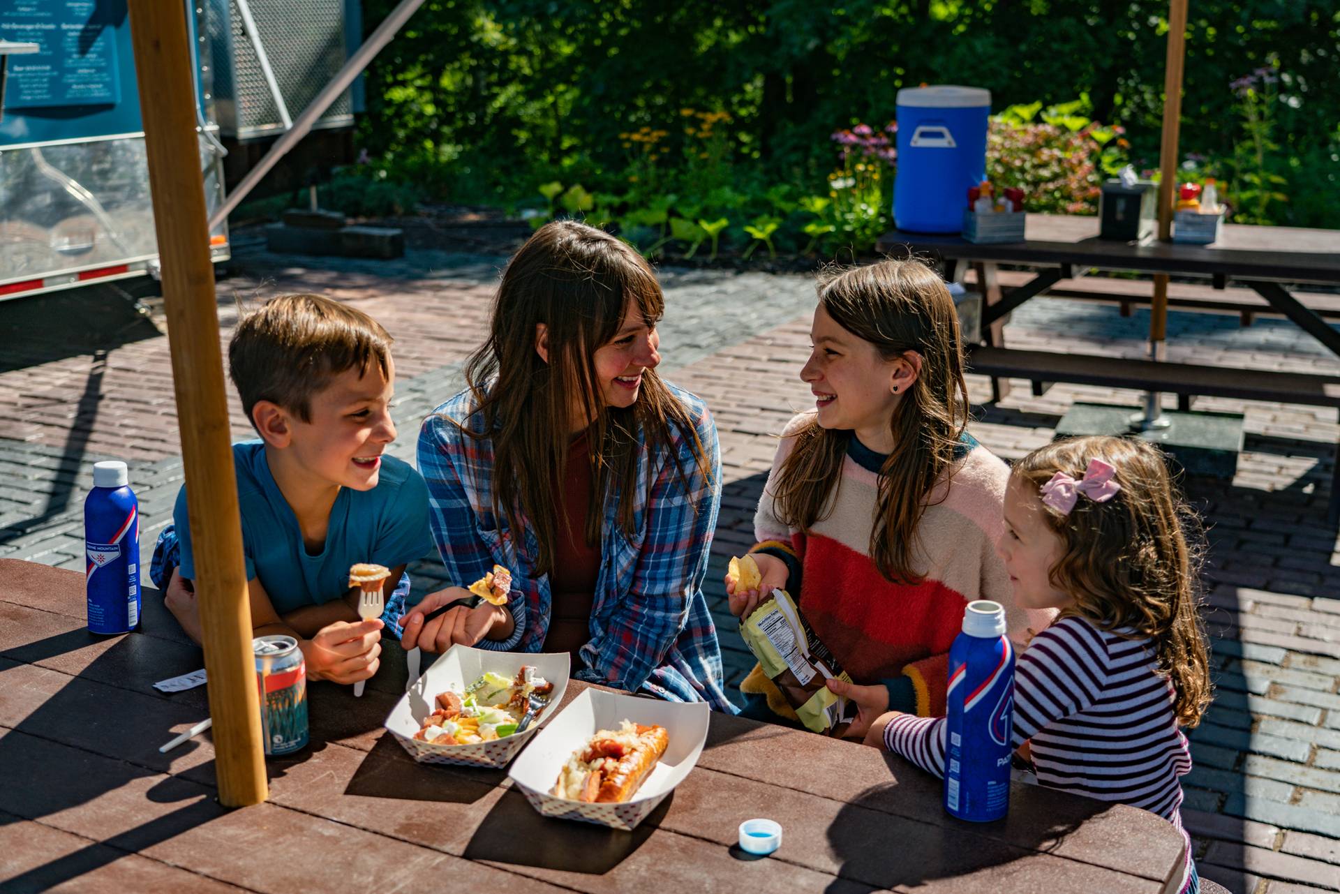 family having lunch at skybridge food truck