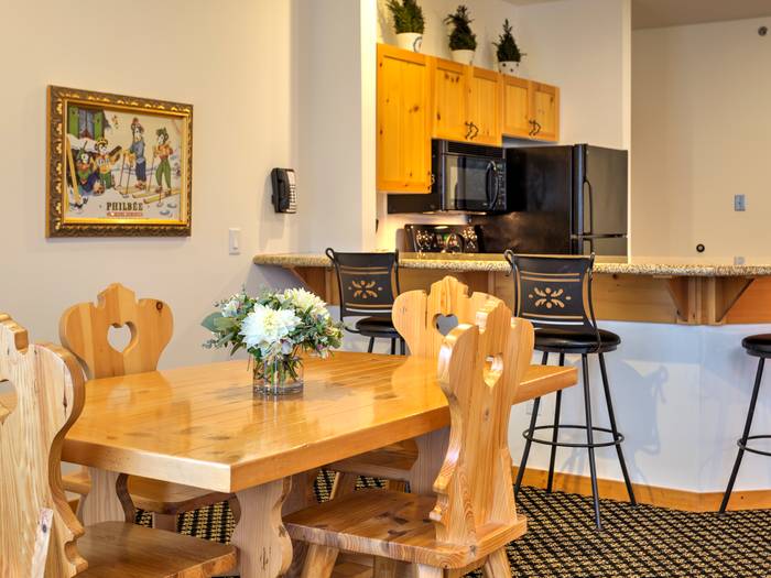 Table and bar area inside Cortina suite.