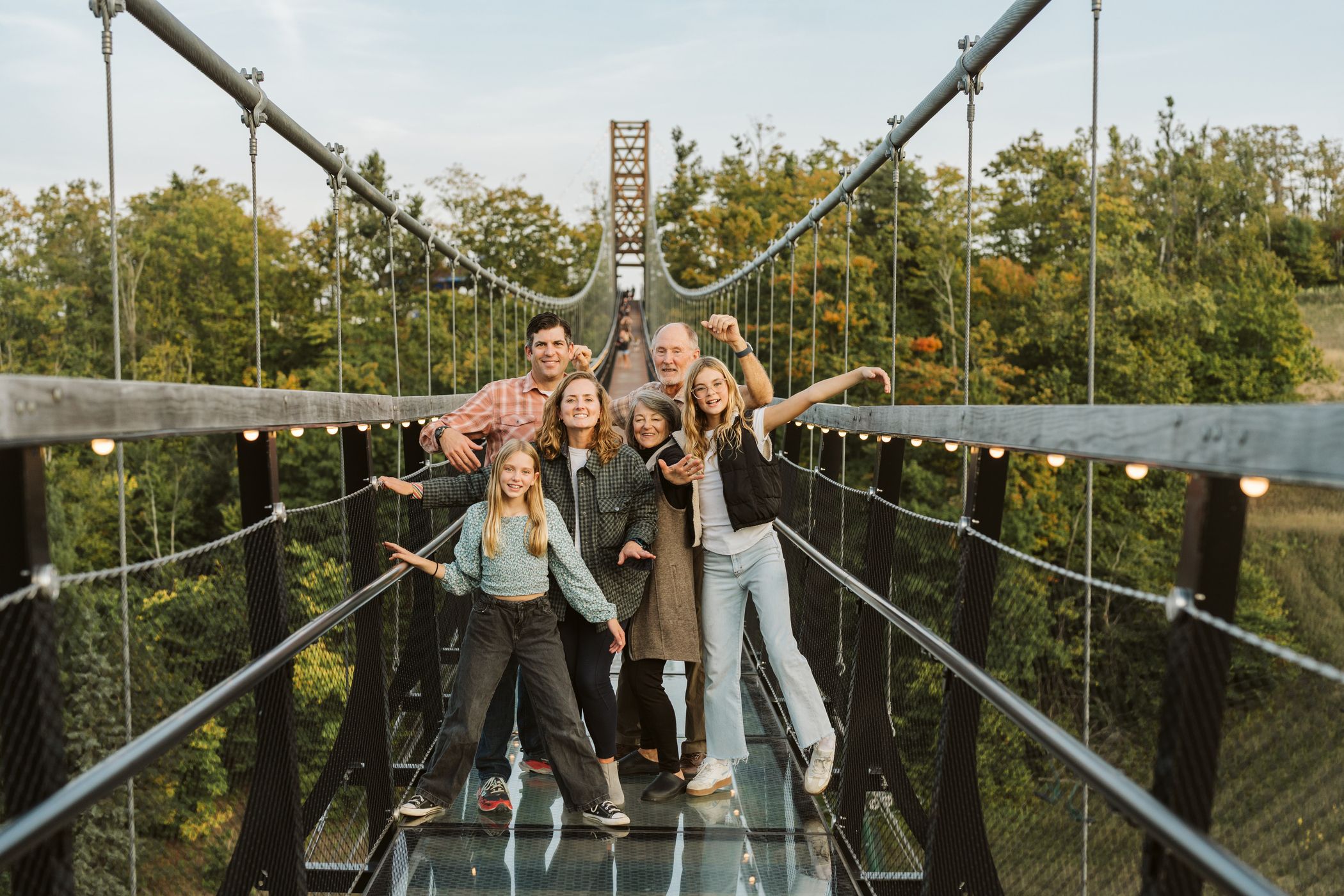 Family posing together on SkyBridge Michigan