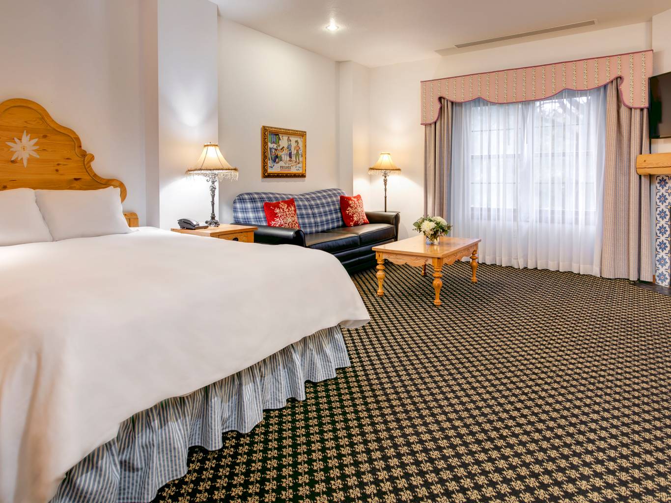 king bed and hot tub in mountain grand lodge