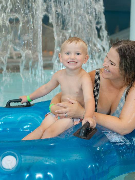Mother and son in lazy river