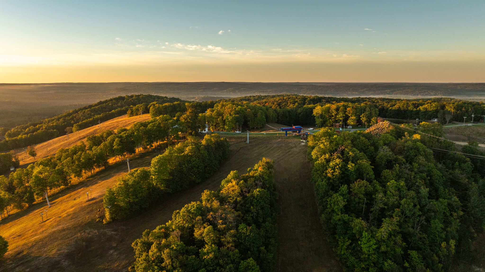 friends riding bikes at the top at boyne mountain