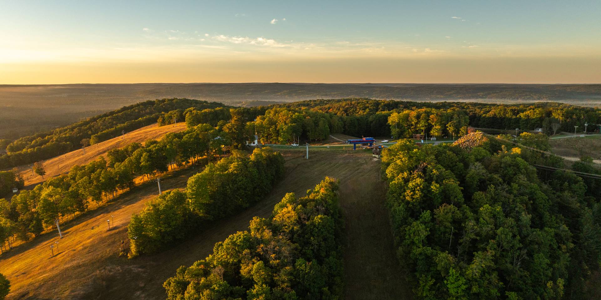 friends riding bikes at the top at boyne mountain