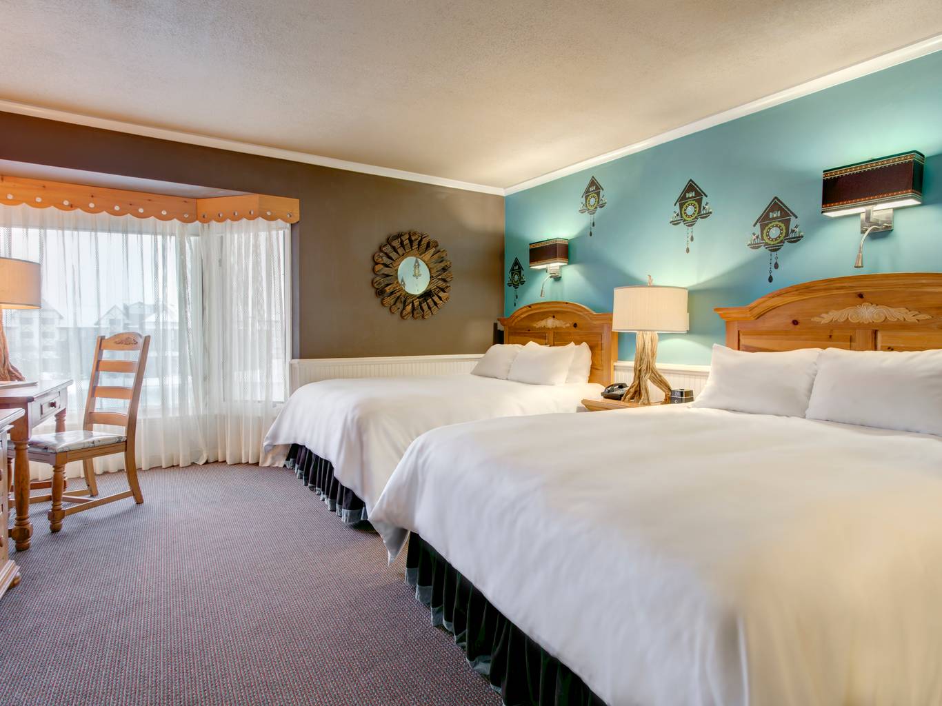 two queen bed in clock tower lodge