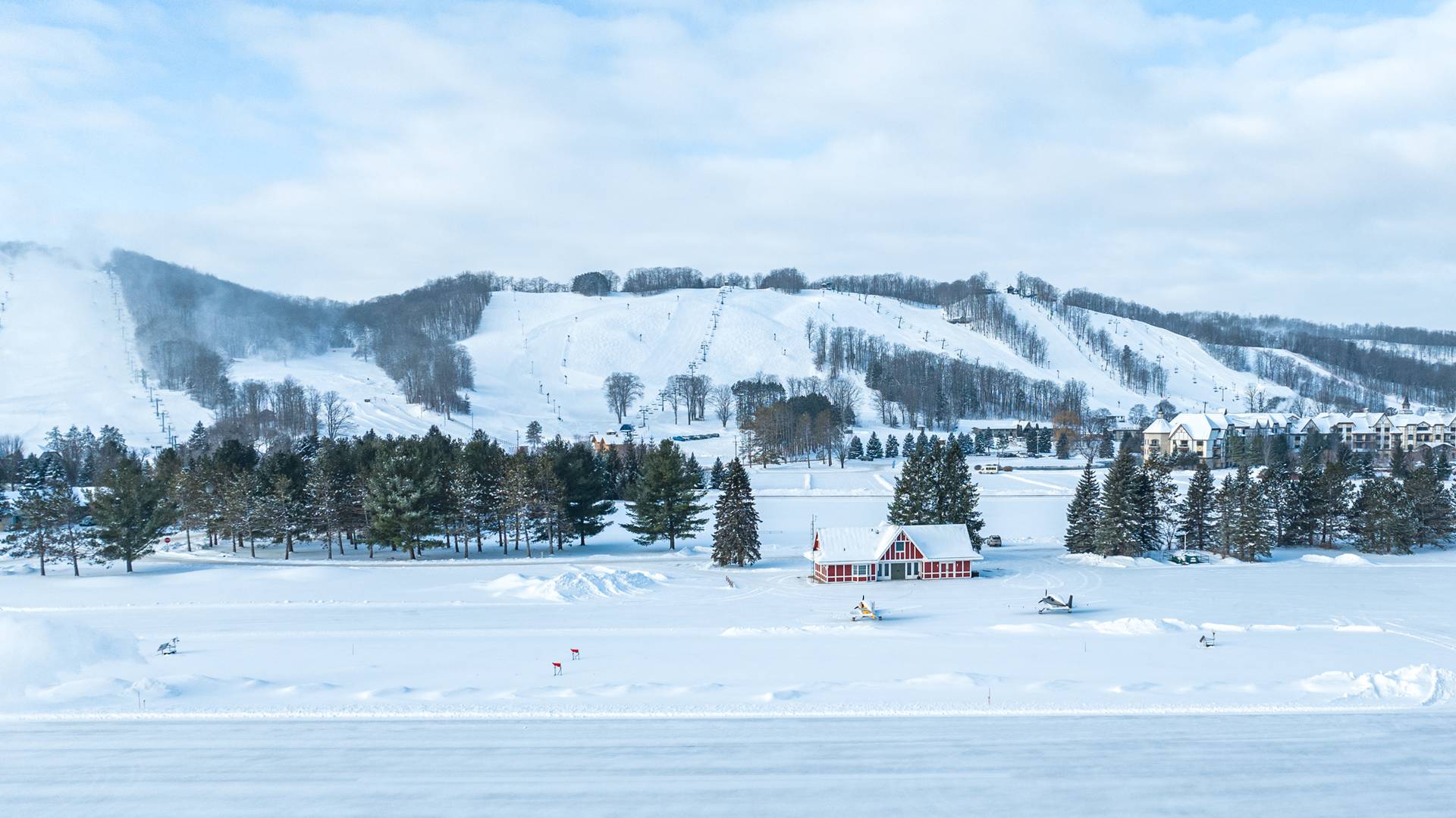 Airport in the winter after upgrades with Boyne Mountain Ski hills in the background.