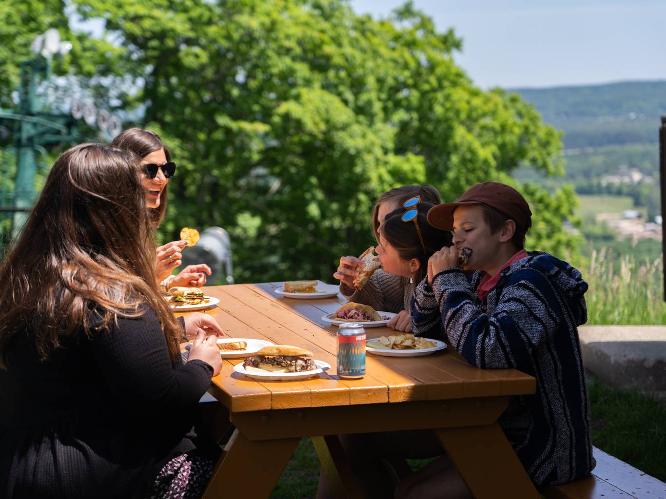 people eating outside eagle's nest