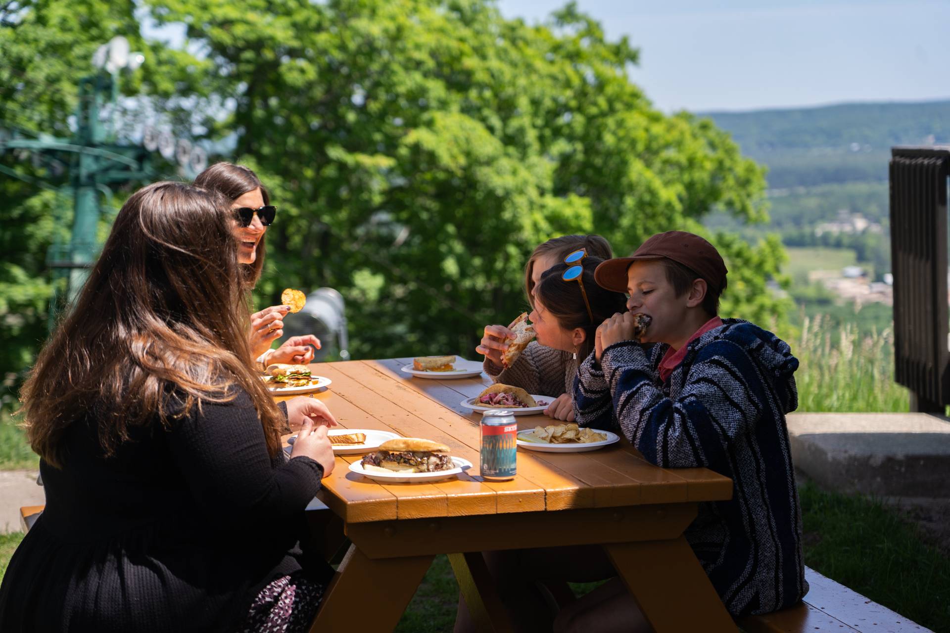 people eating outside eagle's nest