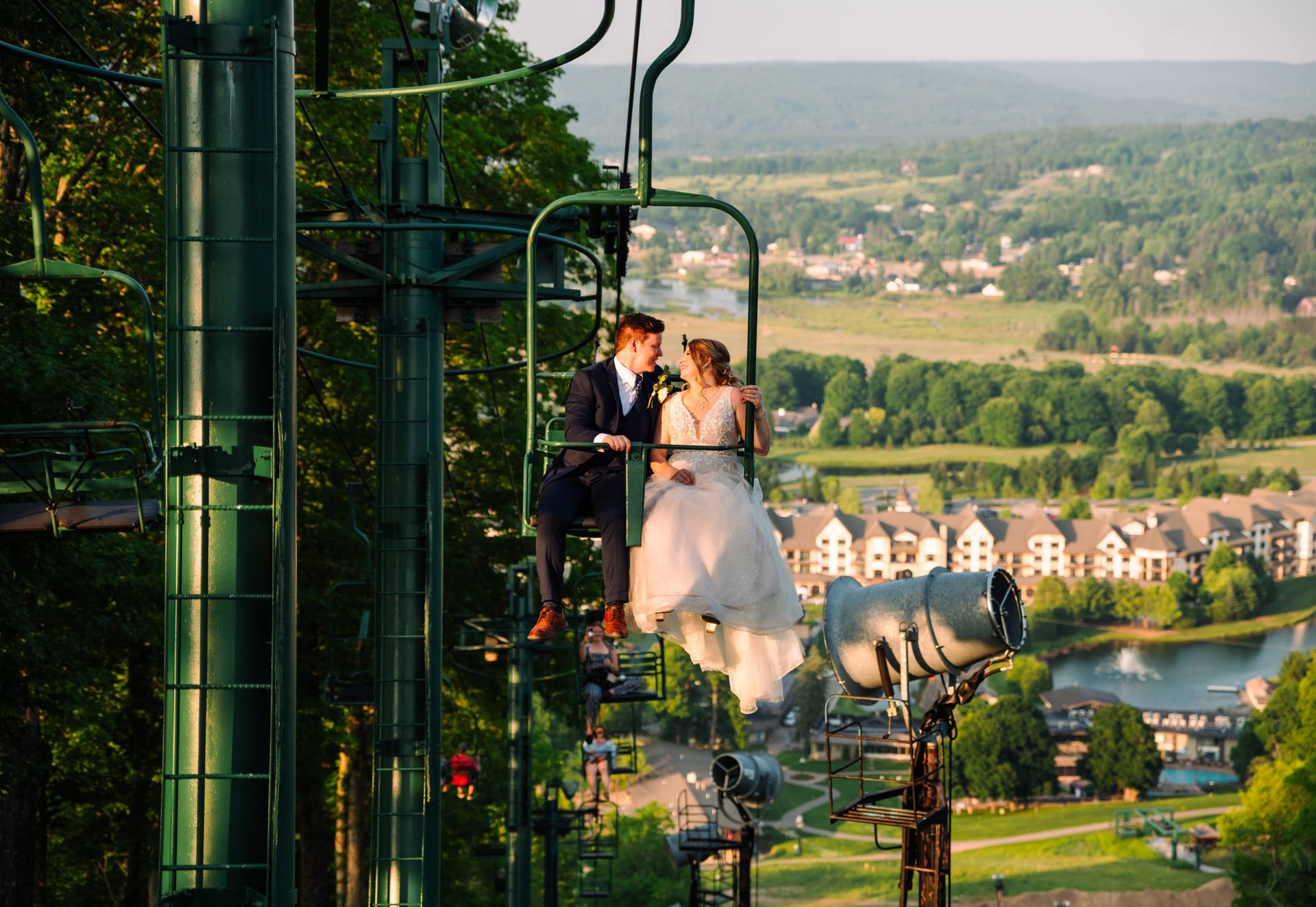 couple riding chairlift