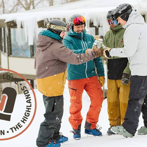 group of skiers at cheersing at Eagles Nest