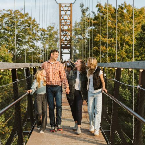 Woman laying in the sauna at Boyne Mountain