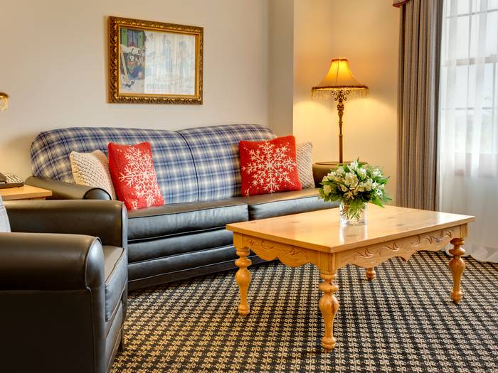 Couch and chair inside Saalbach suite.