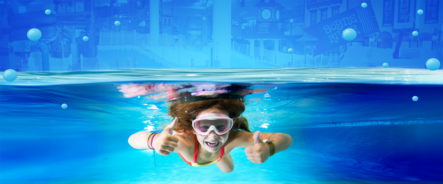 underwater picture of girl at Avalanche Bay Waterpark