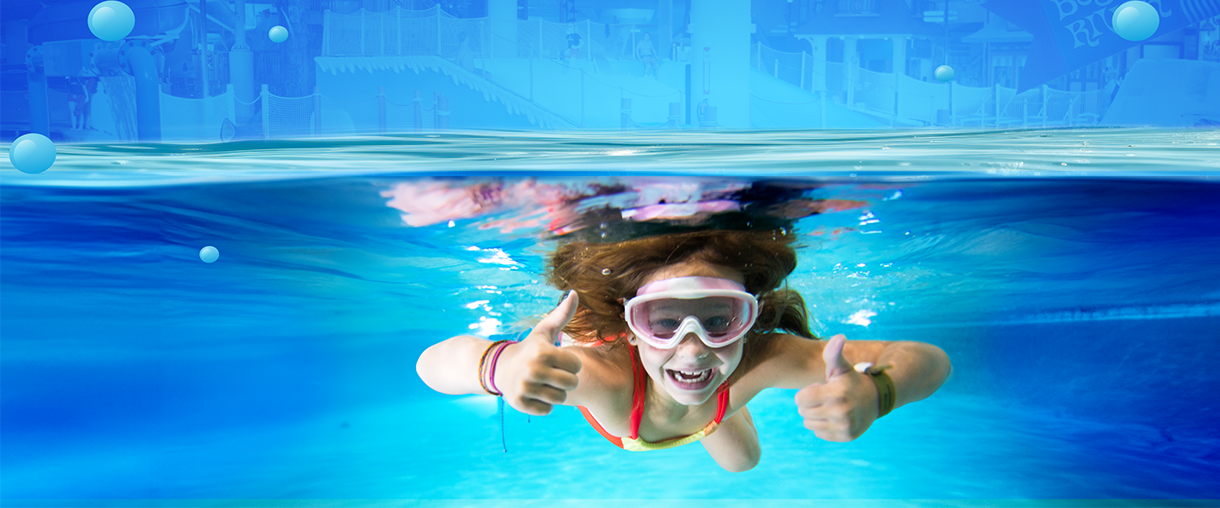 underwater picture of girl at Avalanche Bay Waterpark