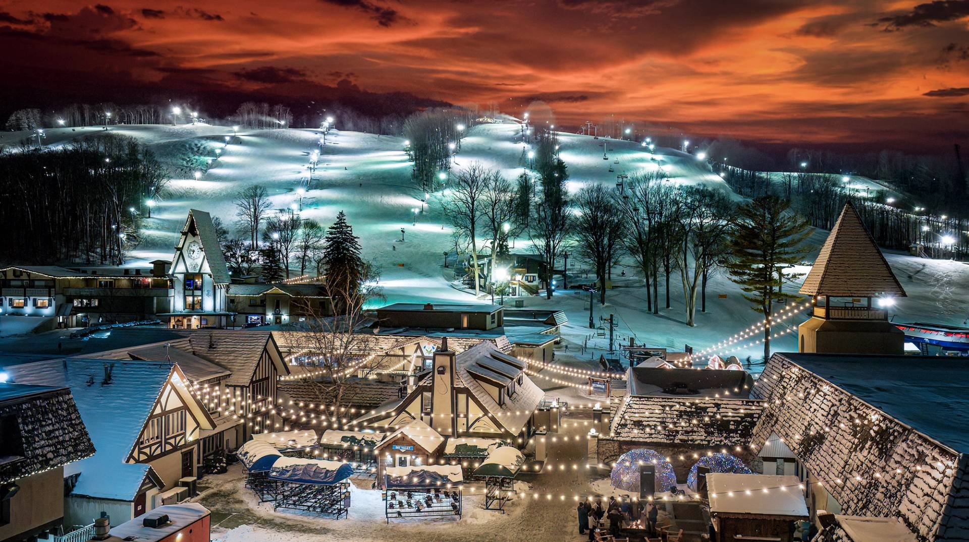 Boyne Mountain at dusk with lights on slopes