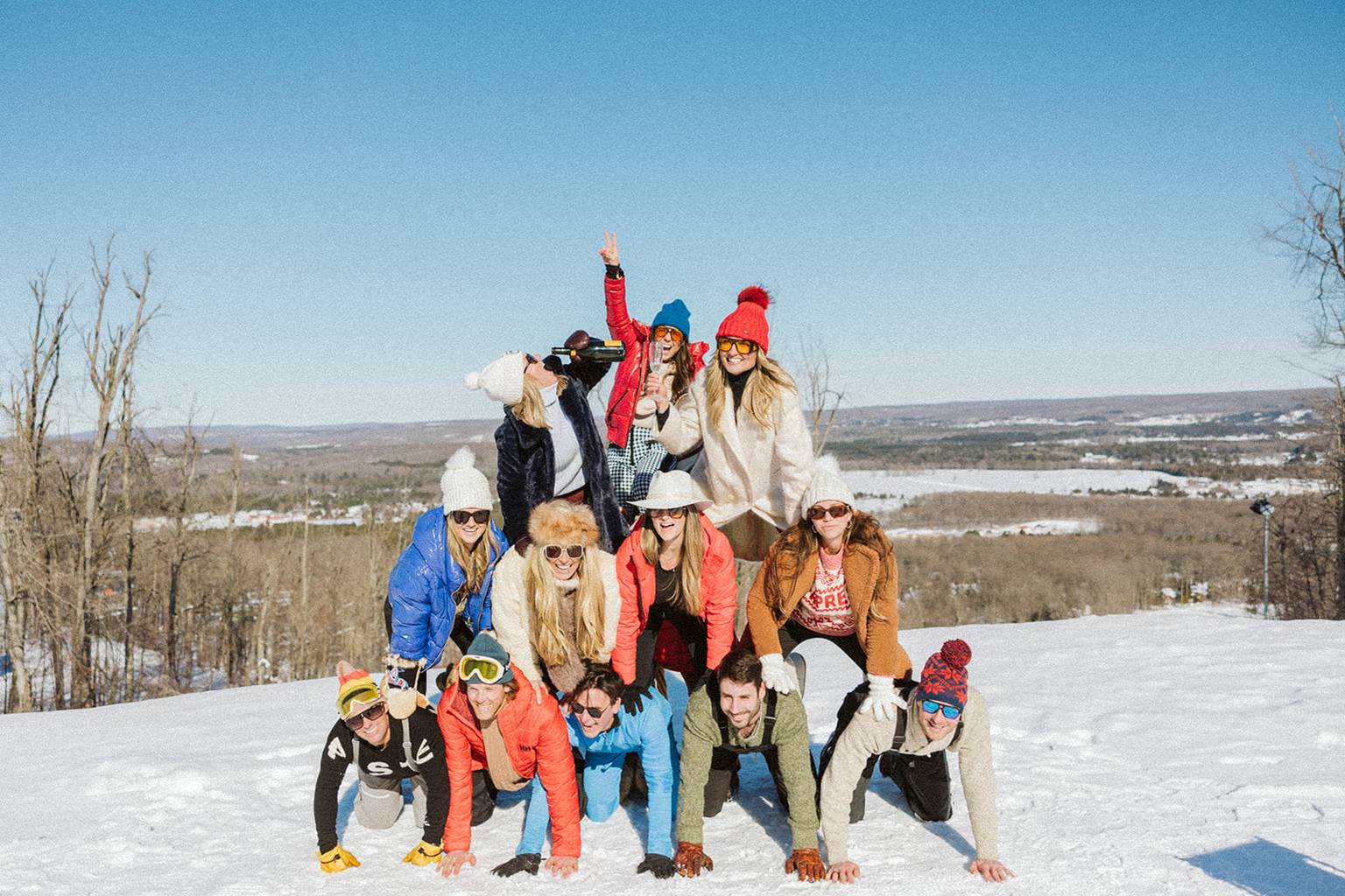 people making human pyramid at iglu