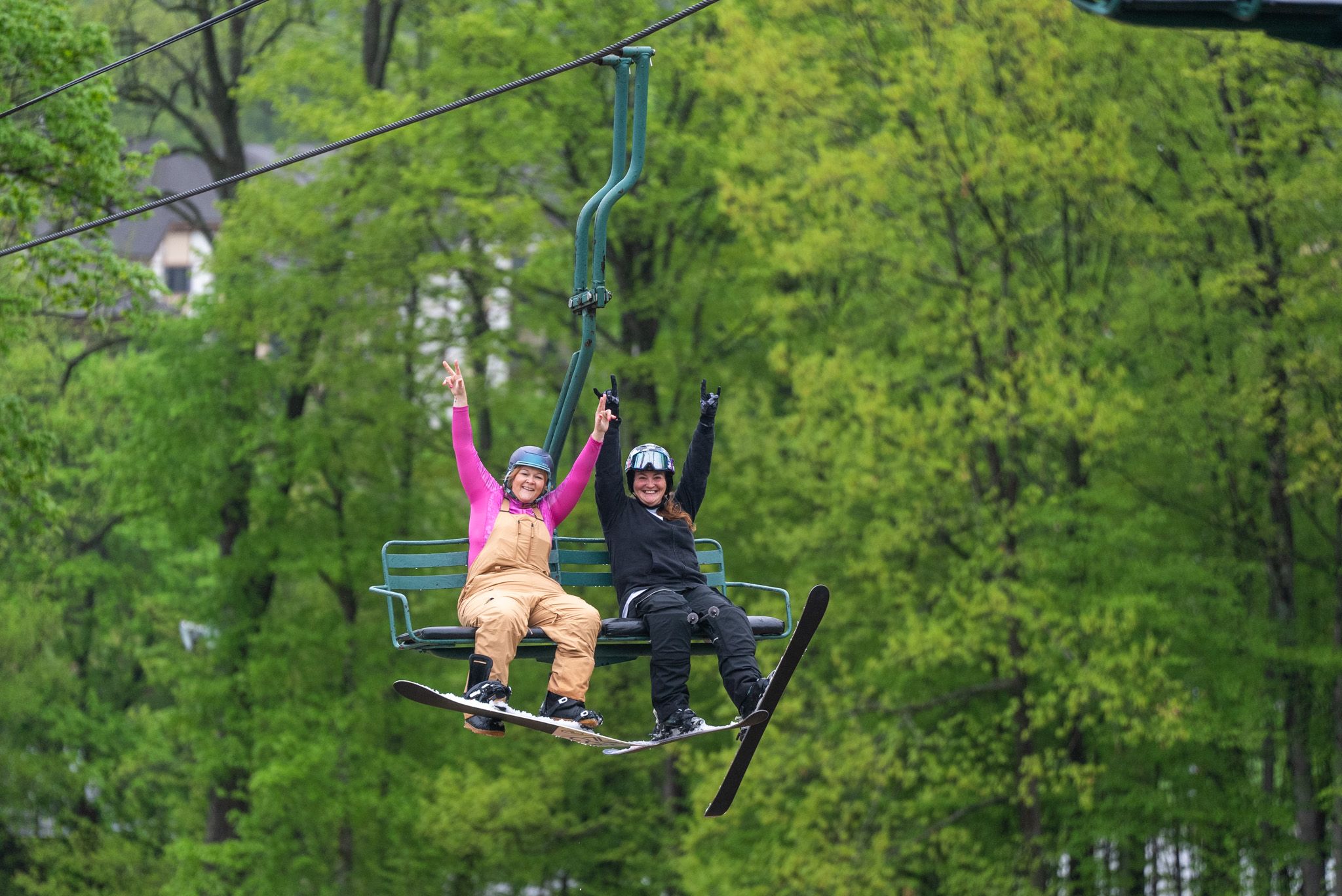 ladies riding victor chairlift