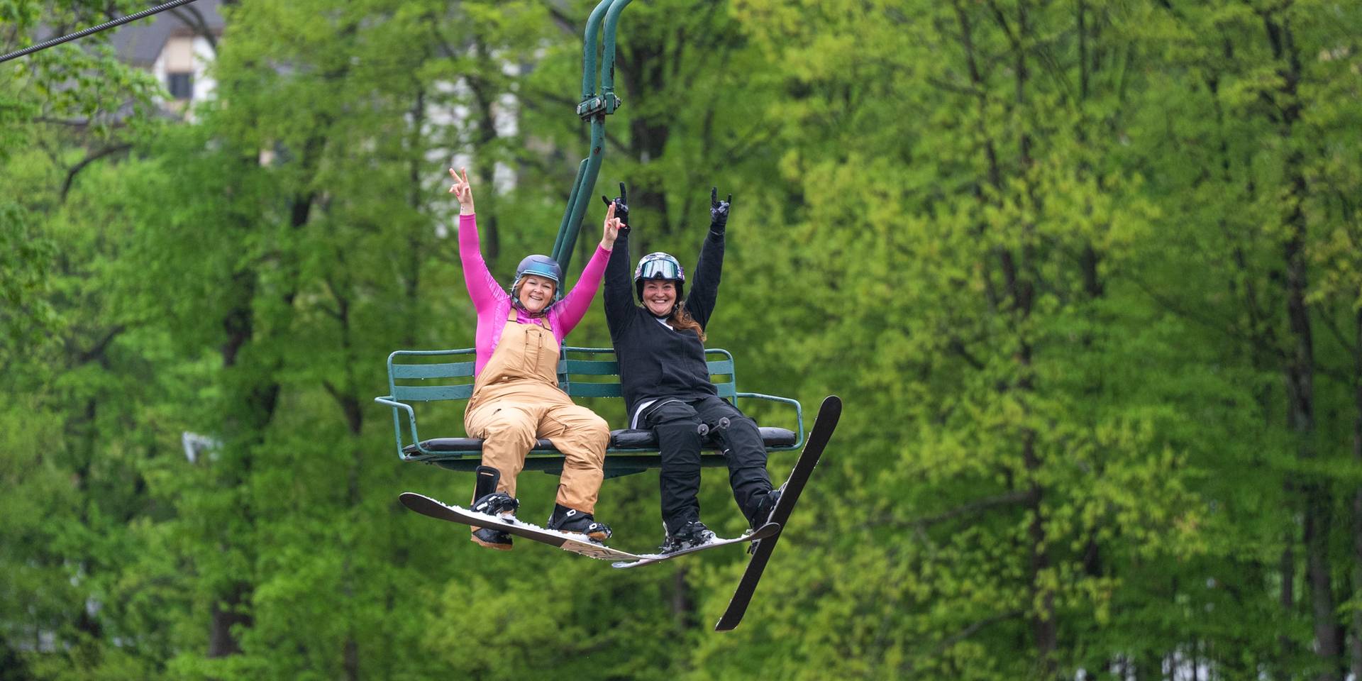 ladies riding victor chairlift