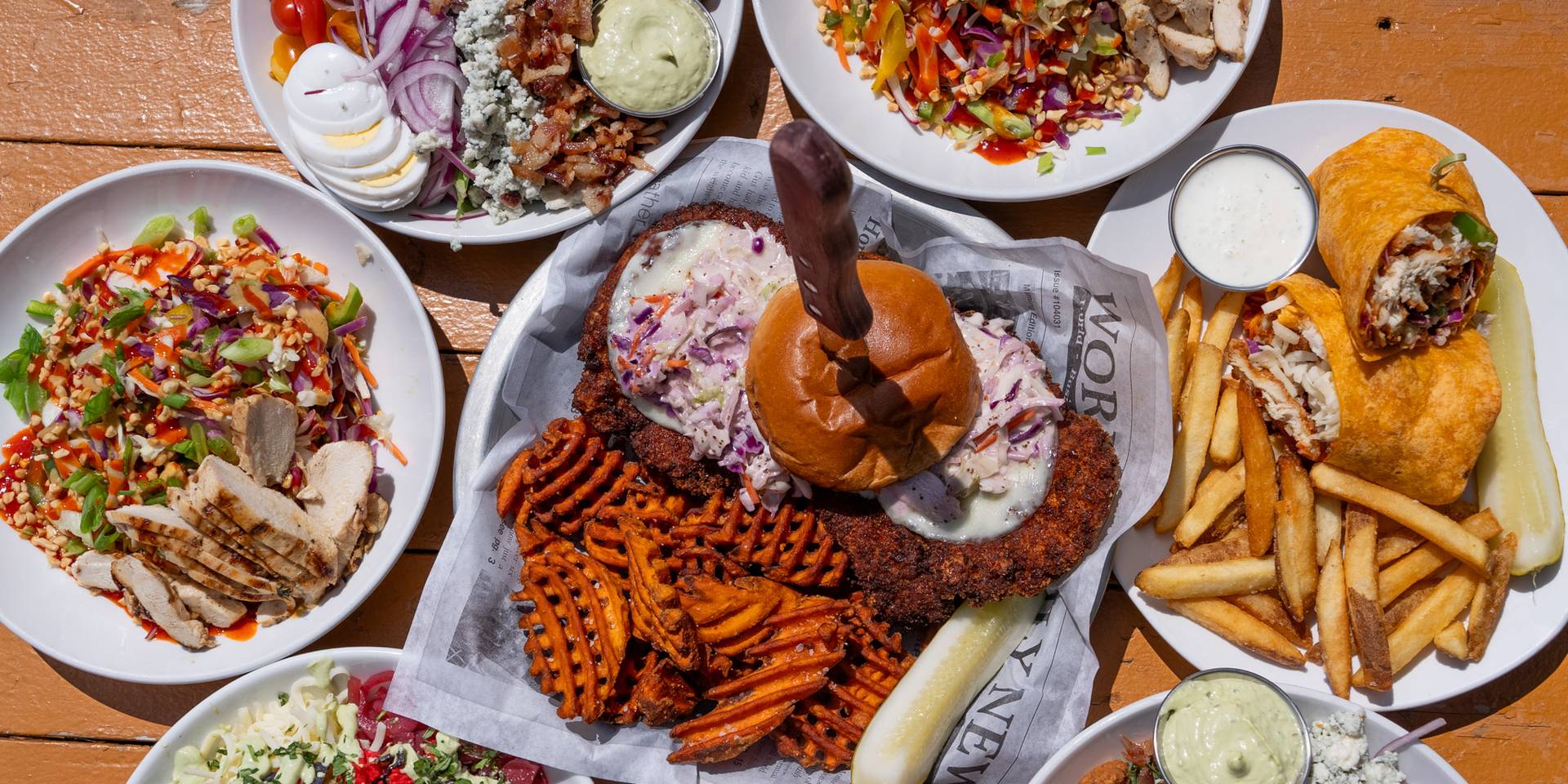 Spread of food on a picnic able outside at boyne mountain