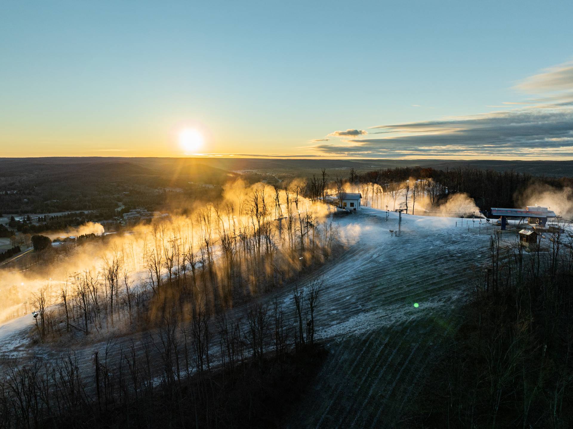 Snowmaking on Boyne Mountain during sunrise