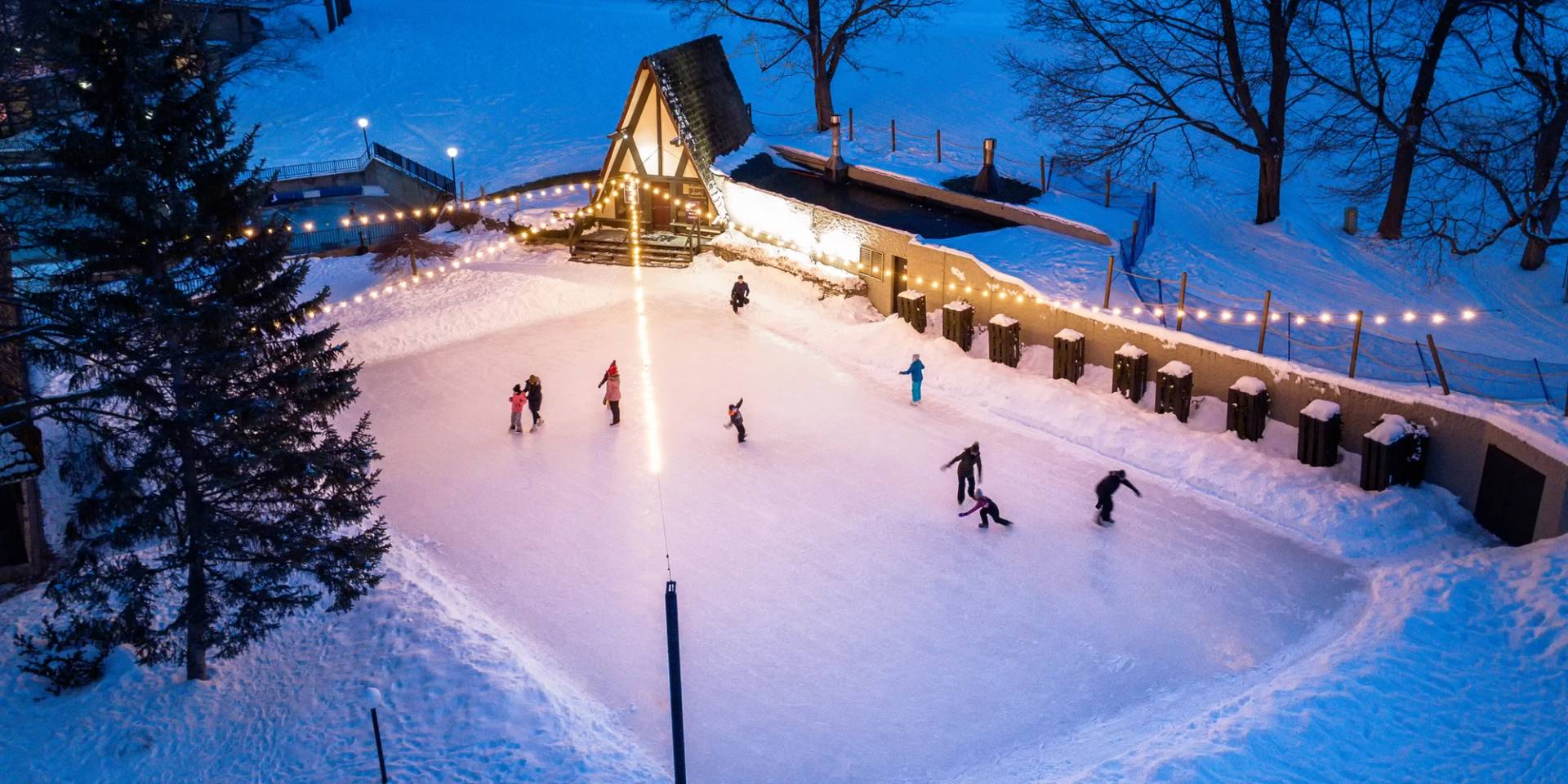 Ice skating behind Clock Tower Lodge