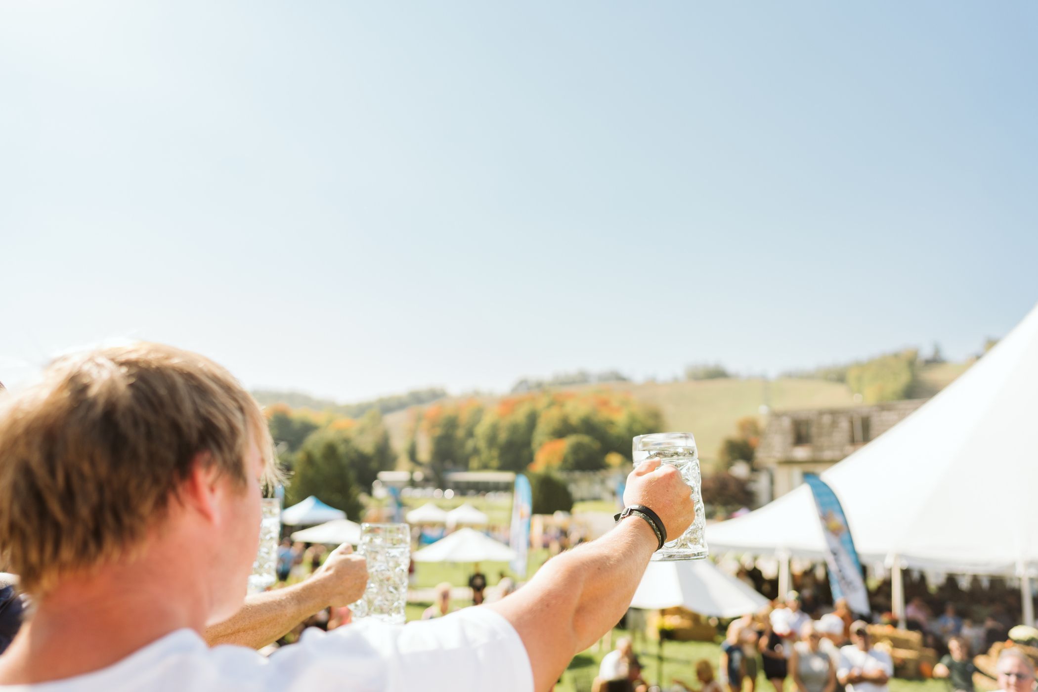 guests stein hoisting at boyne mountain resort 