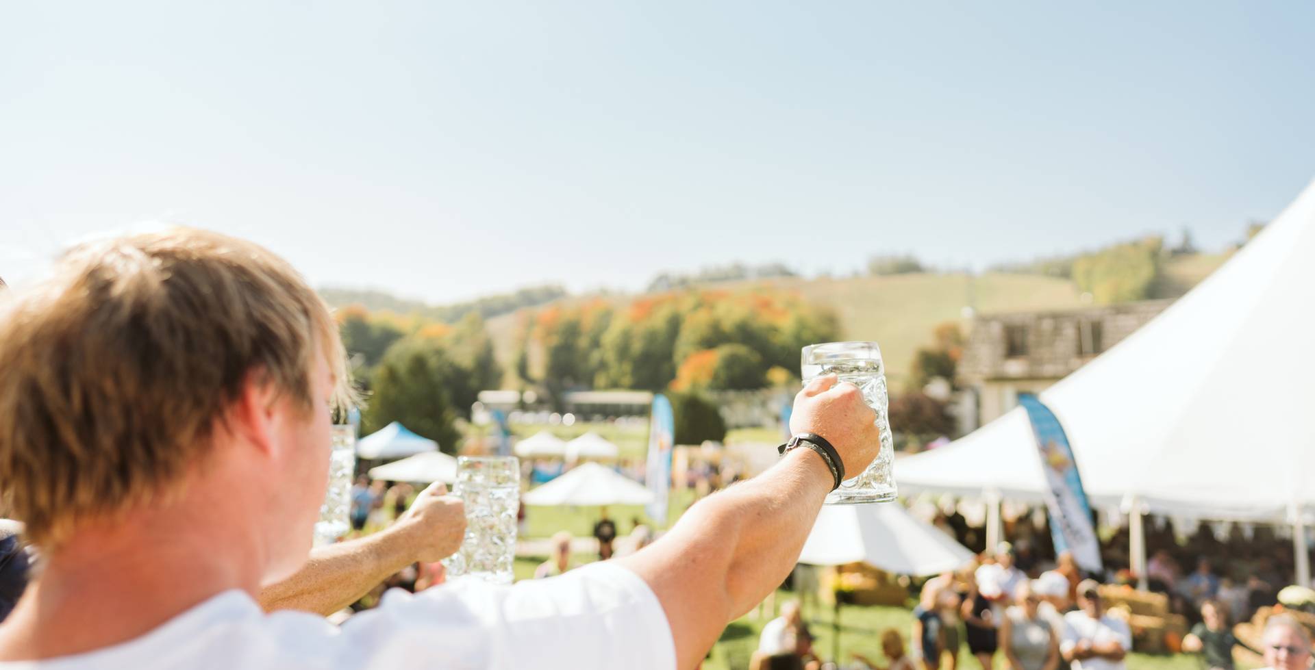 guests stein hoisting at boyne mountain resort
