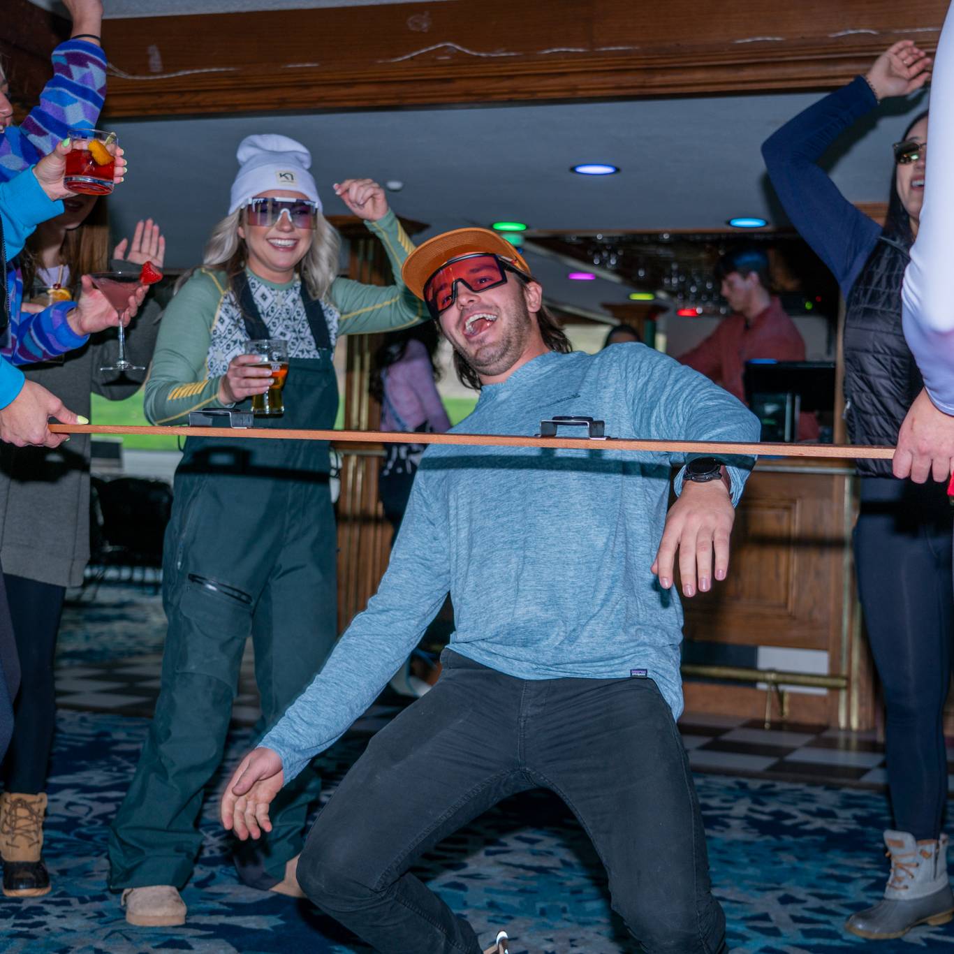 people doing the limbo in snowflake lounge
