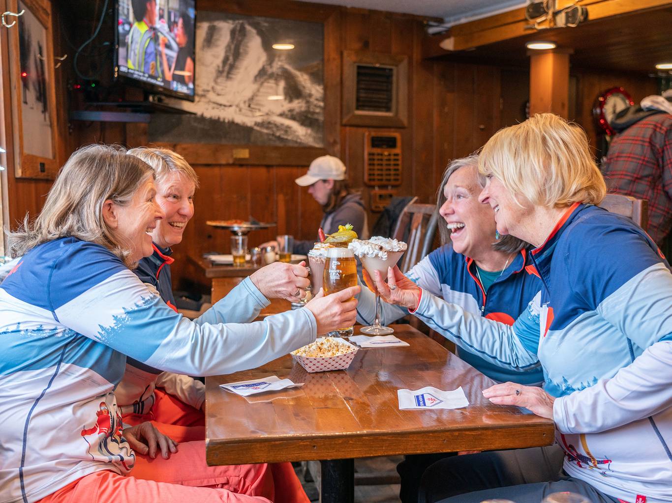 ladies cheersing drinks in the Trophy Room