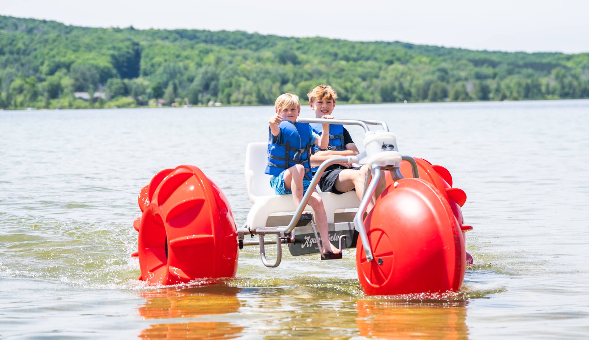Two boys on a aqua cycle on Deer Lake