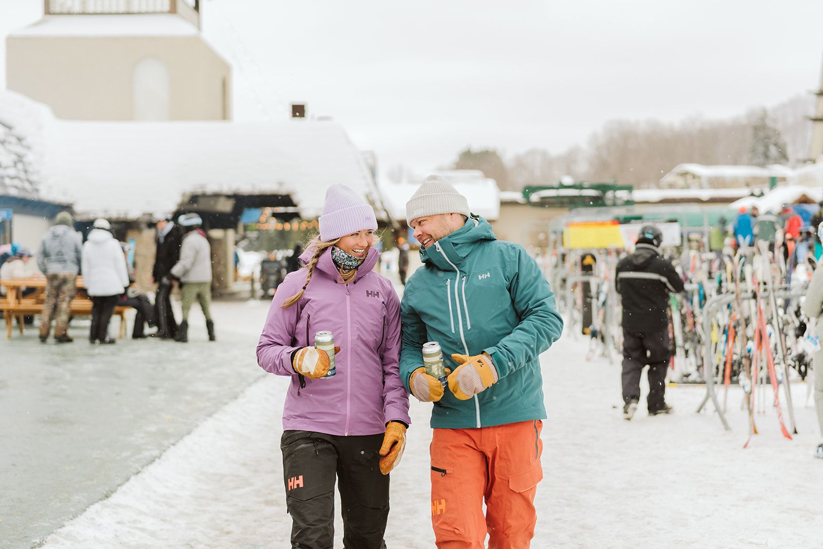 people carrying skis