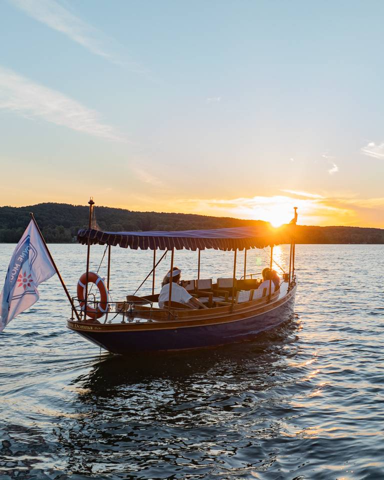 deer lake boat tour at sunset