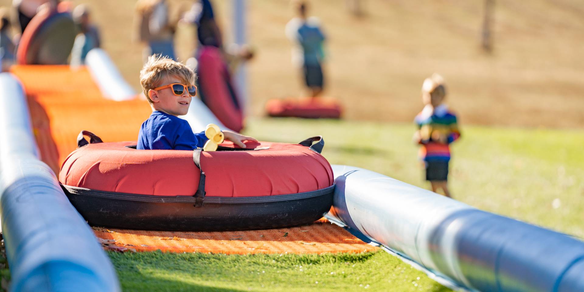 child tubing at skitoberfest