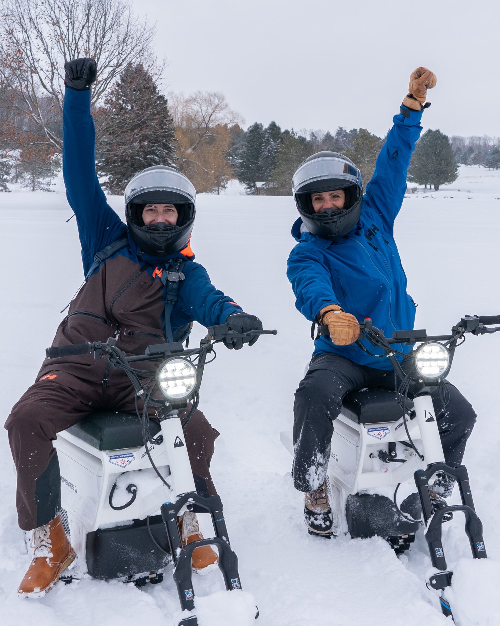 Two people on MoonBikes