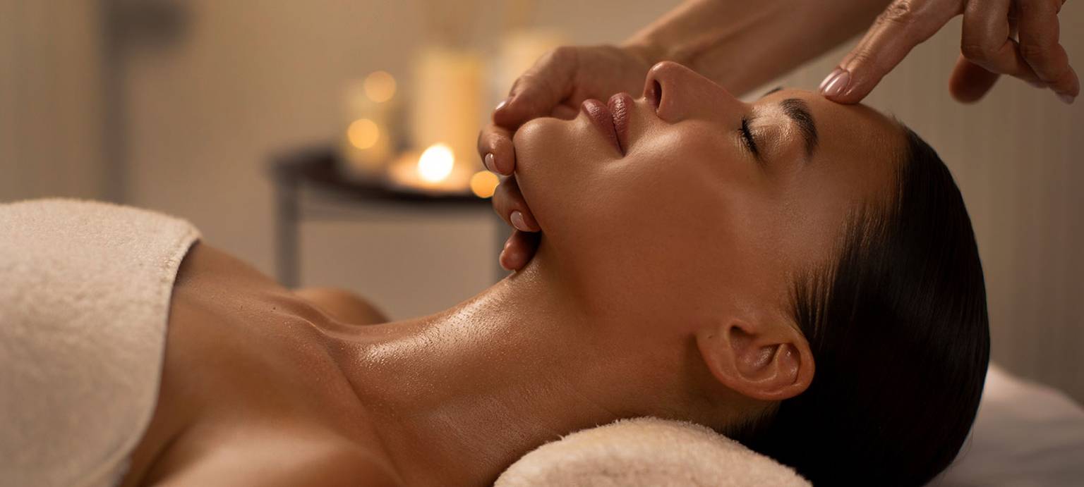 Lady enjoying a massage at The Spa at Boyne Mountain