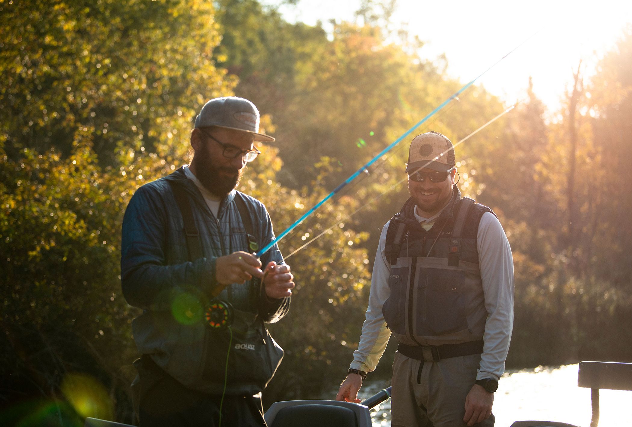 Two guys fly fishing