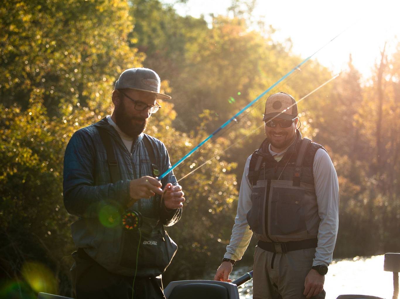 Two guys fly fishing