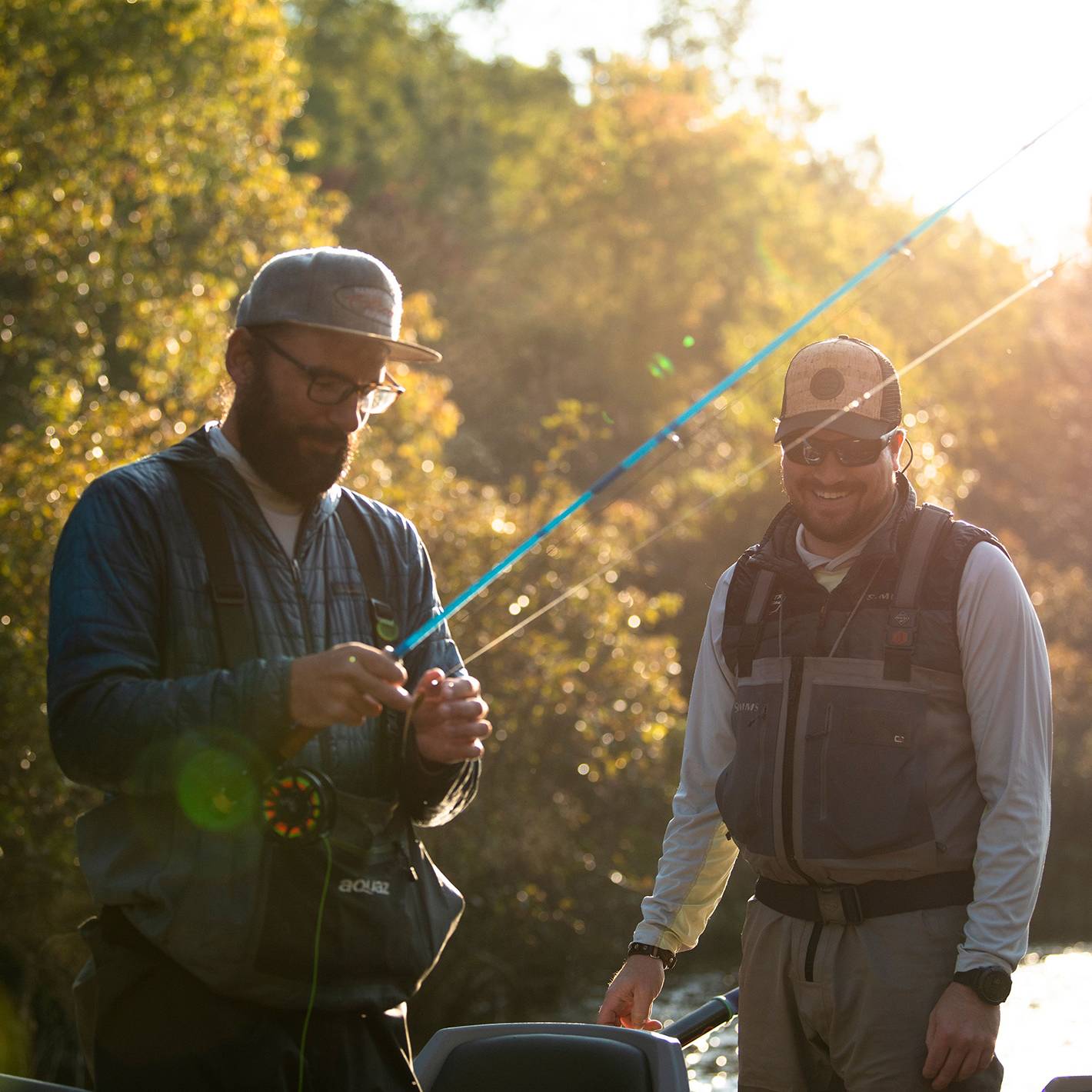 Two guys fly fishing