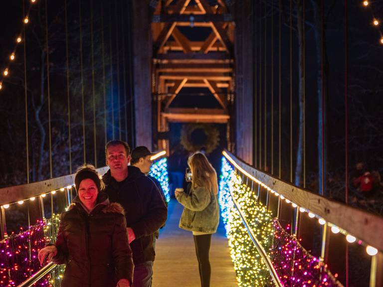 People walking skybridge michigan