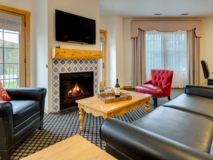 Living room area inside Corina Suite.