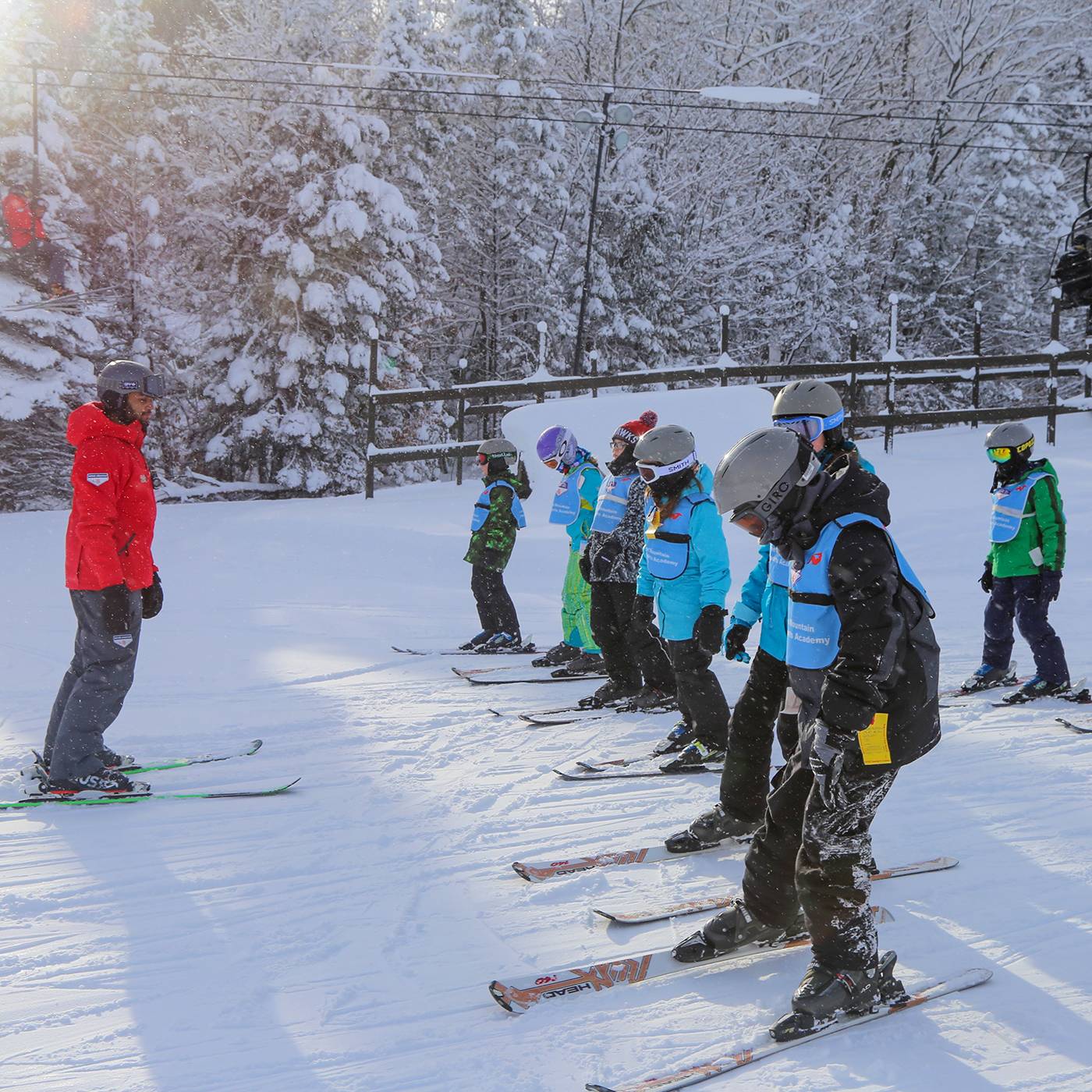 Instructor teaching group of children