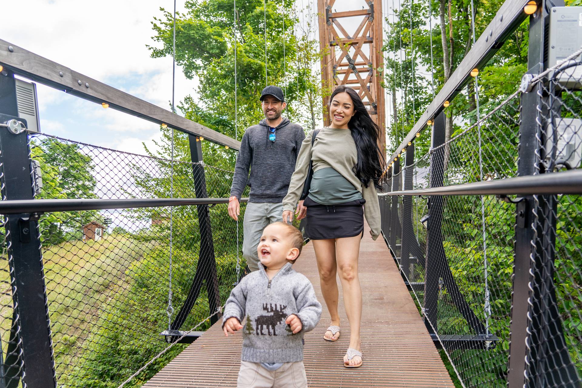 family walking on SkyBridge Michigan