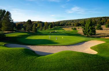 golfers playing on the monument course