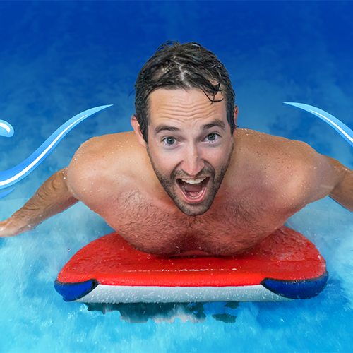 Dad on boogie board at waterpark