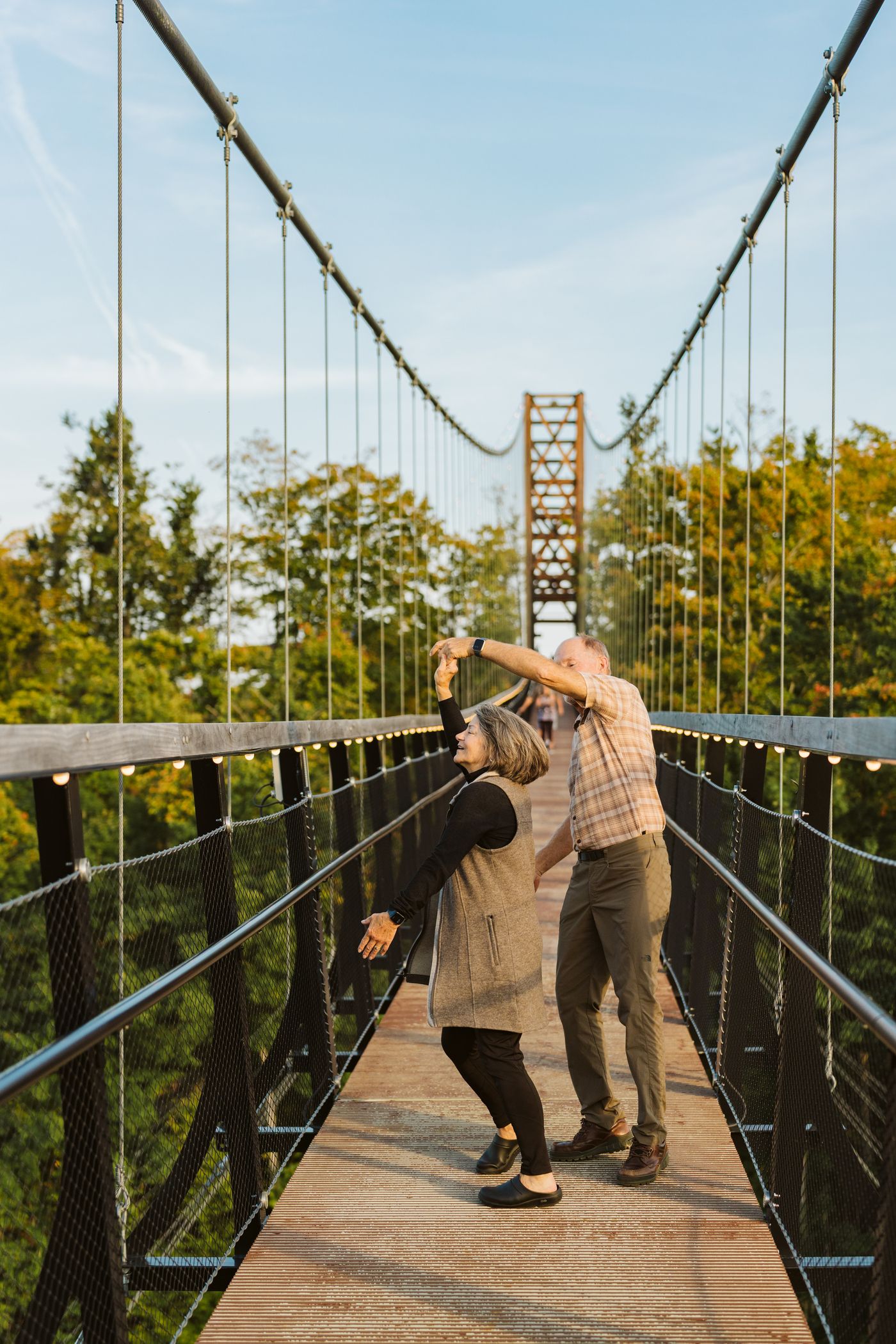 couple dancing on skybridge