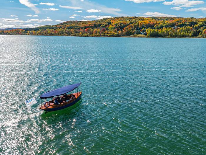 Deer Lake boat tour with fall colors