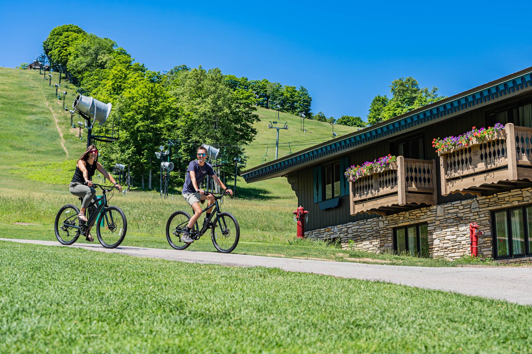 chalet guests riding bikes