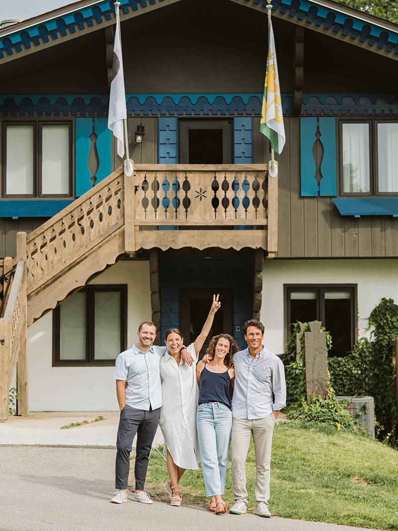 Couples posing outside Chalet Edelweiss