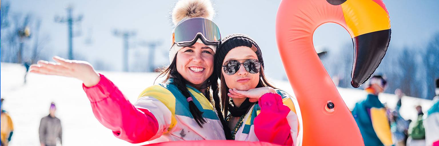 Girls in a Flamingo tube on the Slopes at Boyne Mountain