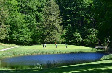group of golfers on monument